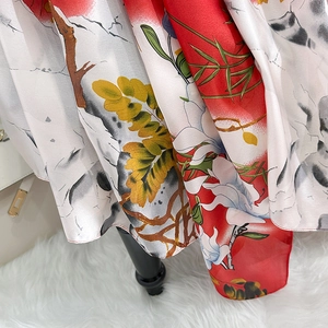 Silky satin long scarf for women featuring vibrant floral prints and smooth texture