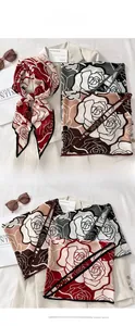 Detail of vintage floral triangle scarf with red rose print on white blazer background