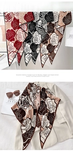 Detail of rose floral triangle scarf with soft velvet texture and elegant print details
