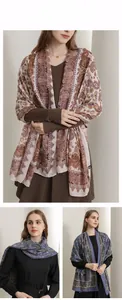 Close-up of elegant cotton linen shawl featuring detailed ethnic Paisley print patterns