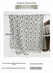 Detailed view of camellia floral print scarf with 180x85cm dimensions and cotton texture