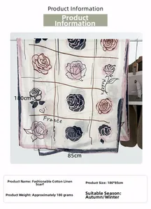 Detail view of cotton linen scarf with floral rose print and France text measuring 180x85cm