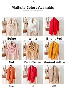 Close-up of minimalist solid color square scarves with short fringes in nine soft tones