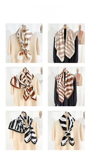 Détail de foulards à rayures zébrées aux tons neutres pour un style de bureau chic