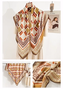 Detail of geometric pattern scarf featuring houndstooth and Greek key maze designs