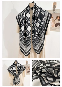 Detail of herringbone silk scarf showing geometric houndstooth pattern and soft texture