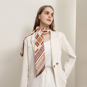 Elegant geometric print silk square scarf with brown and orange patterns for women