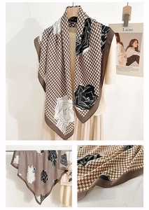 Detail of herringbone pattern square scarf with brown floral rose print and elegant finish