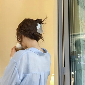 Creative playful grey cat hair claw clip for elegant half-up hairstyles and buns