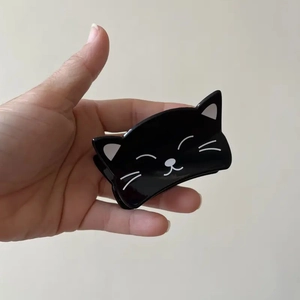 Linda pinza para el pelo de gato negro con detalles blancos para peinados chic