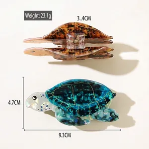 Elegant ocean sea turtle hair claw clip made of premium acetate in blue and tortoise colors