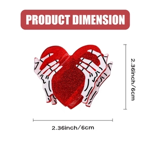 Pinza per capelli a mano di scheletro con cuore rosso glitterato di circa 6 cm di misura