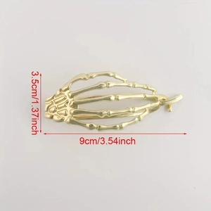 Pince à cheveux main de squelette dorée style punk avec mesure de 9cm de long