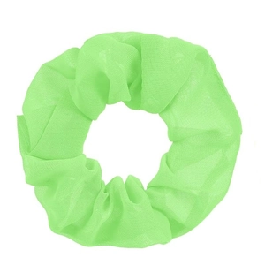 Close-up of a neon green organza scrunchie with soft ruffled texture and elastic hair band