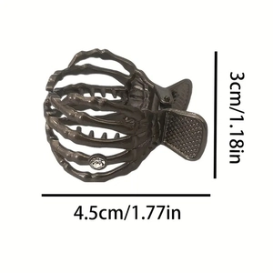 Punk skeleton hand hair claw with rhinestone detail in antique silver finish