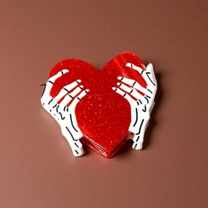 Pinza per capelli a cuore rosso glitterato con mani di scheletro per stile Halloween