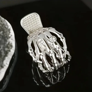Polished silver metal skull claw hair clip with sparkling rhinestone gothic style