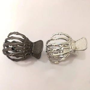 Punk style metal skeleton hand hair claw clips with rhinestone details for Halloween