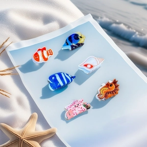 6-piece ocean themed hair claw clip set featuring starfish, seahorse and seashell designs