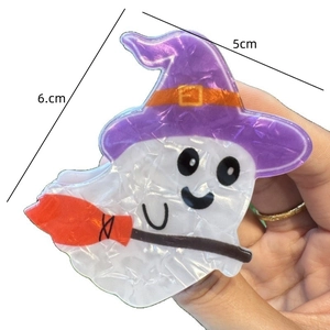 Playful Halloween ghost hair claw with purple witch hat and broom, size 6.0cm x 5.0cm