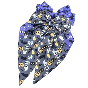 Halloween layered bow clip with ghost and pumpkin prints on purple and black fabric