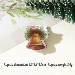 Detaillierte Ansicht der Weihnachtsglocken-Haarspange aus Acryl mit roter Schleife und Blättern
