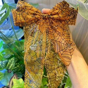 Pince à cheveux Halloween avec nœud orange à motif toile d'araignée et rubans