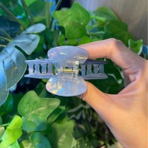 Iridescent lavender whale hair claw clip for women featuring a strong metal spring grip