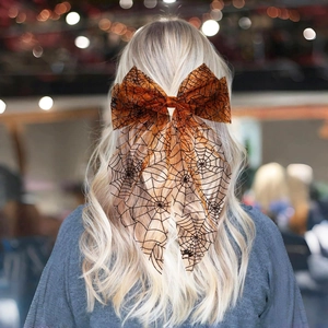 Serre-tête Halloween avec nœud en résille orange et motif toile d'araignée