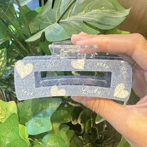 Blue denim texture hair claw clip with heart and lucky letter prints for women