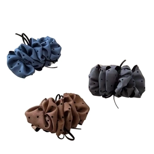 Three-piece set of polka dot pleated scrunchies in blue, grey, and brown colors