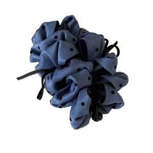 Blue polka dot fabric bow banana clip hair accessory for women with a vertical ponytail grip