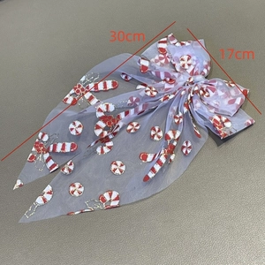 Christmas mesh bow hair clip with red and white candy cane patterns, 30cm size