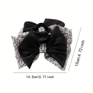 Floral bow hair claw clip detail showing dimensions 5.71 by 4.72 inches on white background