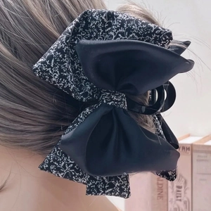 Elegant French vintage floral hair claw clip with black satin ribbon and bow design