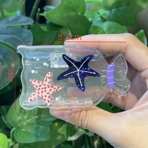 Pince à cheveux transparente en forme de bonbon avec étoiles de mer pour les vacances