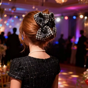 Elegant black and white tweed bow hair claw clip for women's updo hairstyles
