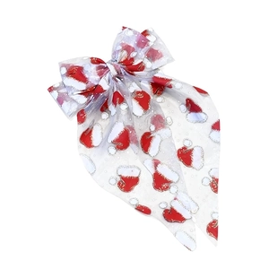 Barrette nœud de Noël en maille blanche avec motifs chapeaux de Père Noël rouges