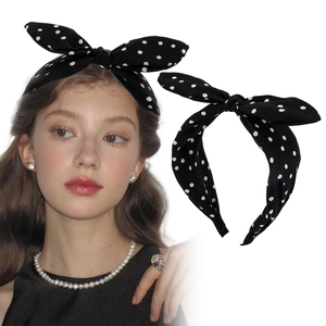 Vintage black polka dot bunny ear headband for women with elegant high-crown design