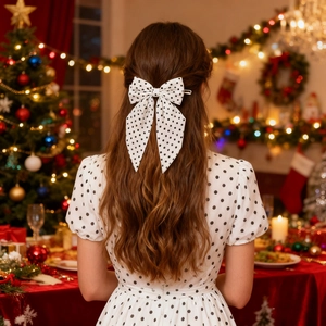 French vintage polka dot bow hair clip with streamer for an elegant back view