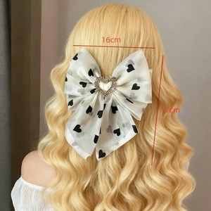 Elegant white mesh bow hair clip with heart print and rhinestone center, 16x17cm size