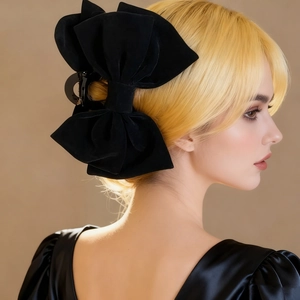 Elegant large black double-sided velvet bow hair claw clip for women's updo hairstyles