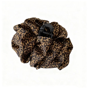 Detail of 13cm leopard print fabric hair claw clip showing soft texture and pattern