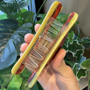 Cute realistic hot dog hair claw clip with yellow and brown translucent colors