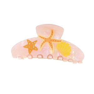 Close-up of pink marbled hair claw clip with orange starfish and yellow shell pattern