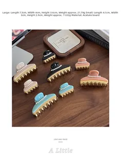 Detailed size and weight specs for acetate hair claws with pearls in small and large