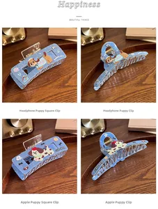 Detail of Korean style blue denim pattern hair claw clips with cute cartoon puppy designs