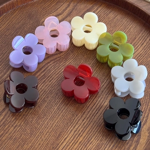 Elegant floral hair claw clips in 8 colors displayed on a wooden tray for styling