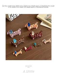 Detailed view of polka dot dachshund hair clips and claws on a vintage wooden surface