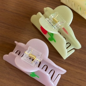 Cute acetate flower hair claws with tulip patterns in cream and pink for women